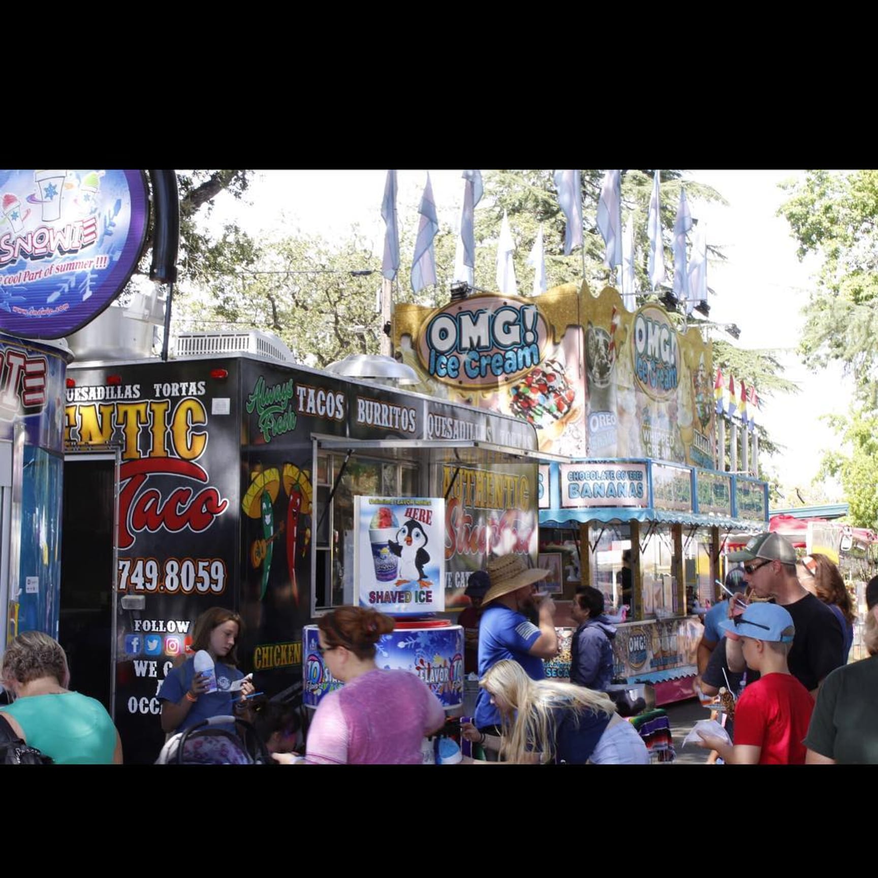 Guests queueing at the Authentic Street Taco stand at a Sacramento fair